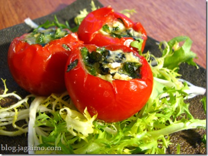 Roasted tomatoes stuffed with cheese and basil