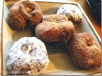 Donuts with cinnamon sugar and powdered sugar